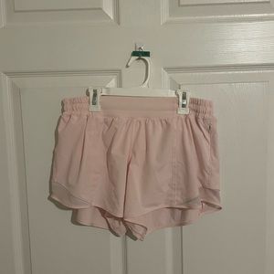 Lululemon size 10 strawberry milkshake hotty hot 4”. Never worn